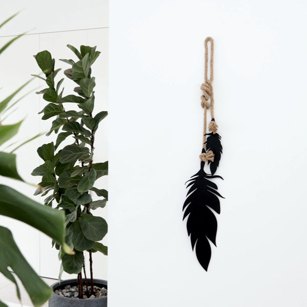 Scandi-bohemian inspired, feathers measures 1.3m, as shown and is suitable for both indoor and outdoor use. The set comes tied with a knot as shown in the photo.   Available in black or white and two sizes