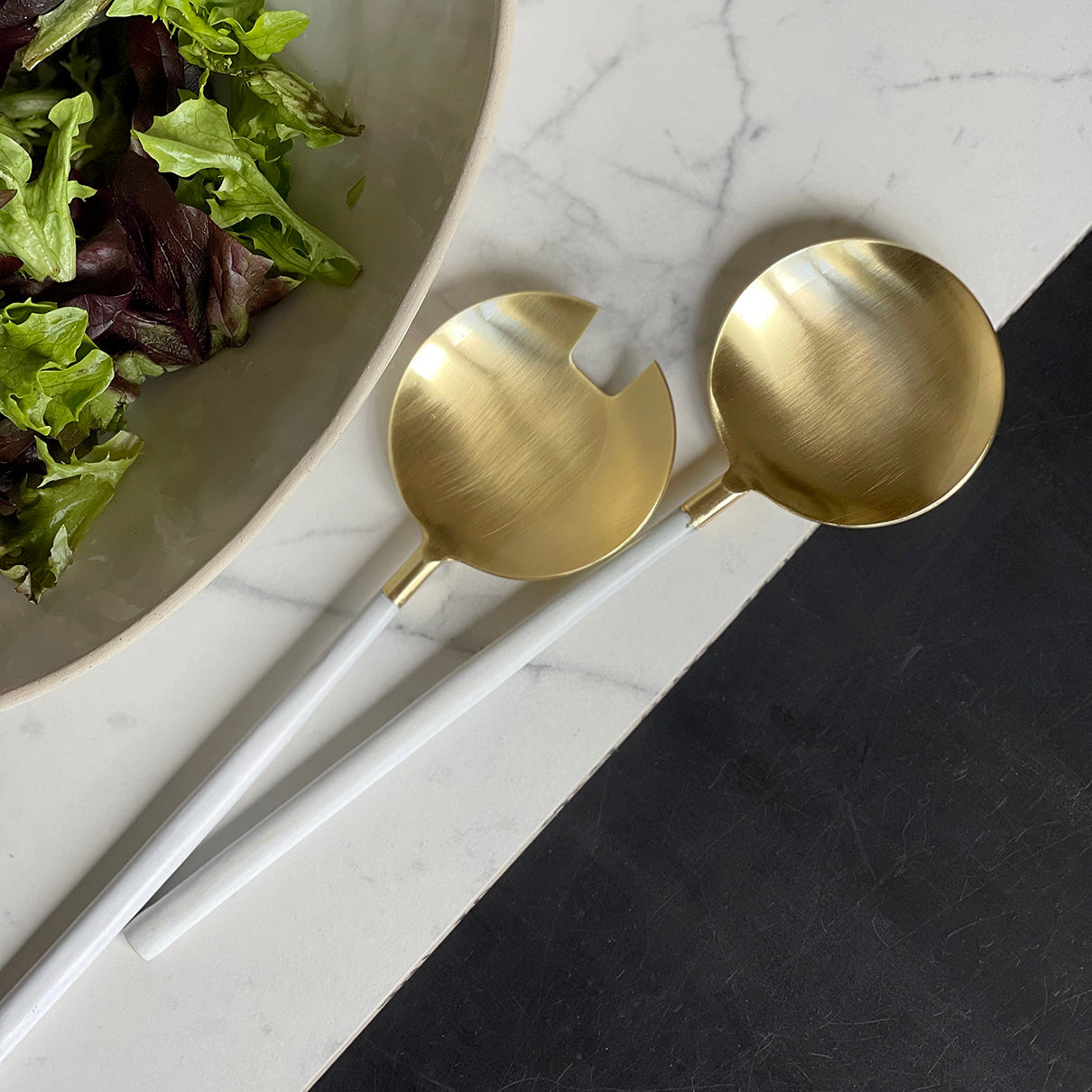 This gorgeous set of Salad Servers is made with full stainless steel and electrophoretic lacquer painting. Dishwasher safe when using a gentle dishwashing tablet. Size: 26cm length