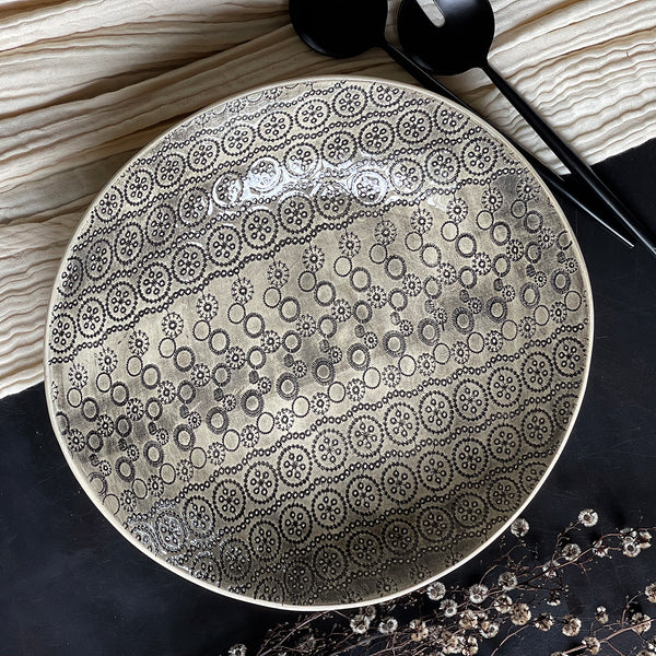 Every single piece of Wonki Ware is made by hand. From a delicate salt dish to a generous platter, each piece goes through the same creative process, which sees the clay moulded, shaped, smoothed and painted during 15 different stages on the journey from clay to table. Spaghetti Bowl Large