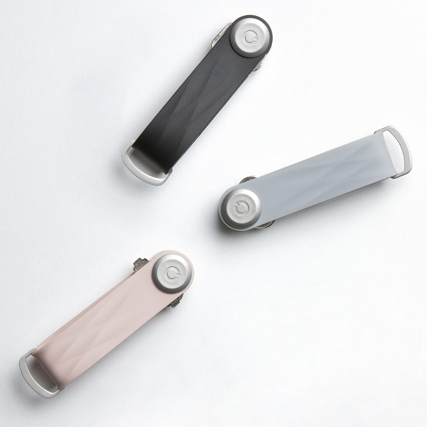 Orbitkey active key organiser. Holds 2 - 7  key in a practicle yet stylish profile. Smooth to the touch and highly resistant to the elements. Available in black, pink, grey