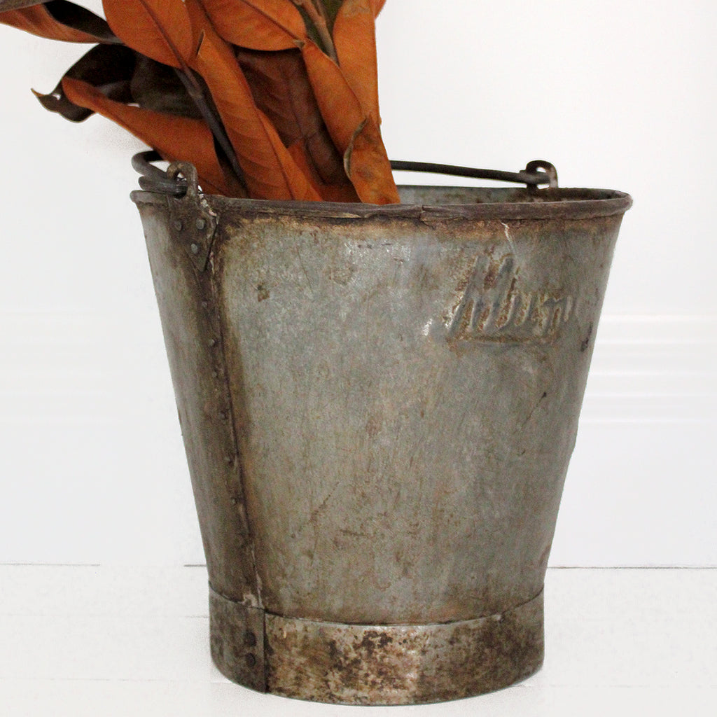 Lovely vintage iron buckets make great planters for lavender or herbs. Alternatively, fill with summer colour using fresh blooms and twigs and place in your entrance way to create something beautiful and inviting.   These planters can be used outside however they will age and some surface rust may occur over time. This can be minimized by spraying with a product like Penetrol.  Handmade using recycled iron. 