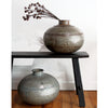 Wonderfully rustic, with exposed rivets, no two pots are the same. These make a great statement on their own or use them to display a few dried flowers.  The Torlouse Iron Pot can be used outside however they will age and some surface rust may occur over time. This can be minimized by spraying with a product like Penetrol  Handcrafted using recycled iron.  Size:  H29 x D35cm