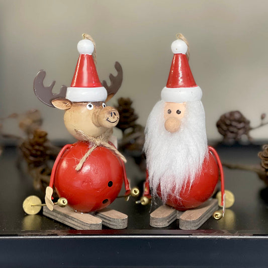 Whimsical Santa/Reindeer Skiing Red Hanging Deco