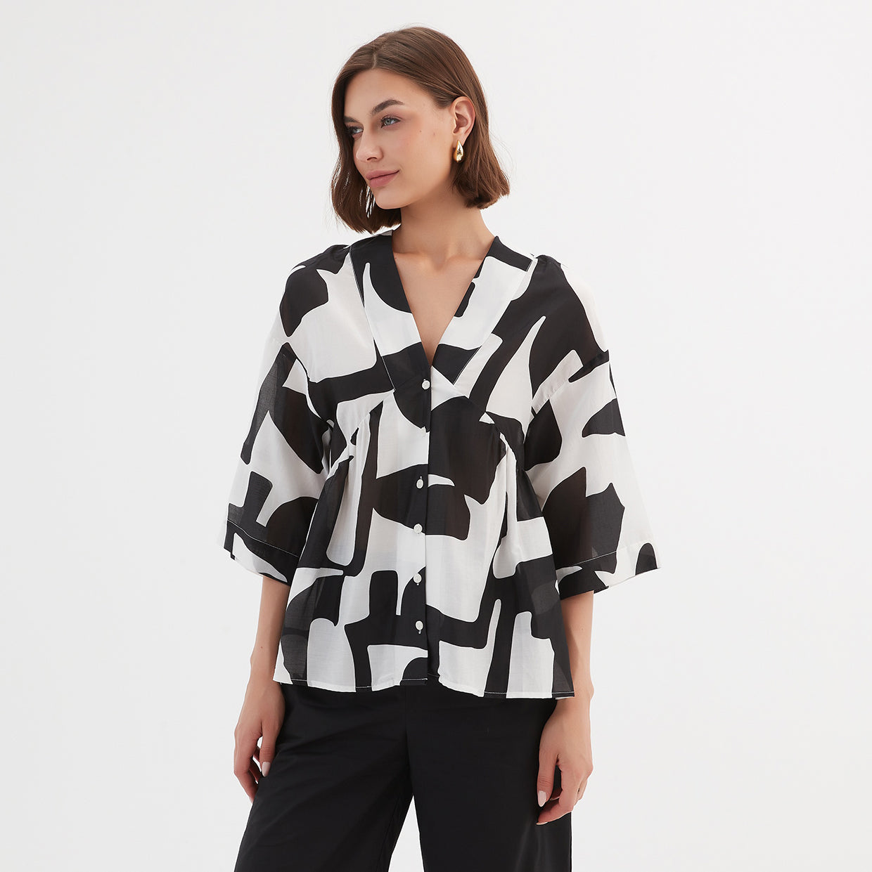 Tirelli V Neck Peplum Top Abstract