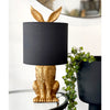 This is just a little bit cute! This gold bunny hiding under a light shade will add a bit of fun to your decor.