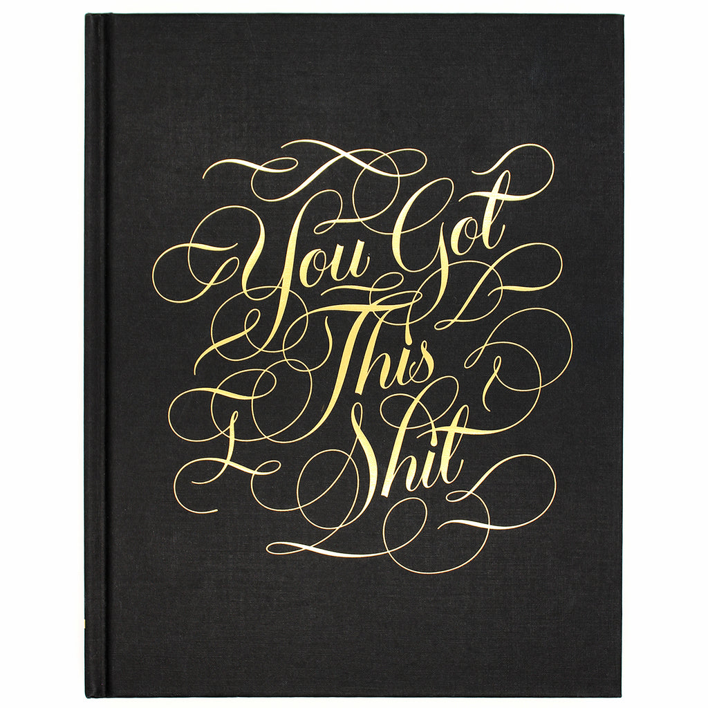 From our bestselling Calligraphuck line, this luxe hardbound journal features uplifting profanity in gold foil-stamped calligraphy on the cover.  With gilded edges, lined and blank pages, and metallic flourishes throughout, 'You Got This Shit' is the journal for anyone who appreciates sassy words of encouragement.  Size: 19 W x 24 L cm