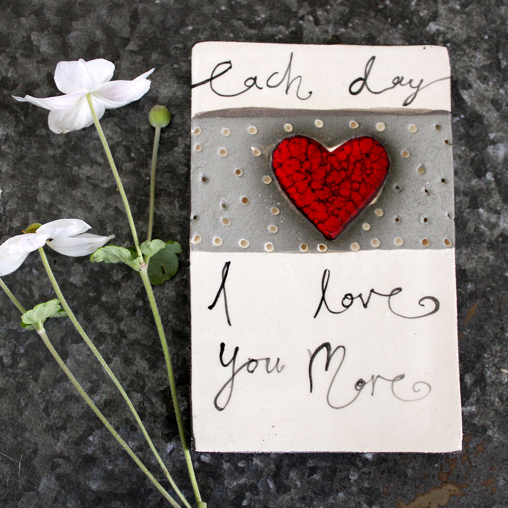 Handmade in NZ!  Ceramic tile featuring an imprinted heart and a beautiful quote.  Ideal for the wall or adorn any coffee table or bedside table in the house.  Size: 11 W x 16.5 L x 1.7 H cm approx