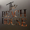 Black Steel - The Beach House The perfect welcome sign for your Beach House. Suitable for indoors or outdoors, The Beach House sign measures 400mm diameter and includes 1 metre of quality jute hemp rope.  Cut from premium quality stainless steel, A Beach House is finished in electro coated matte black.  Suitable for outdoor use. The perfect sign for your beach house - or a fabulous gift! Lisa Sarah Designs
