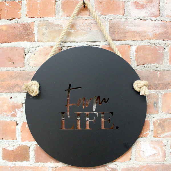Black Steel - Farm Life The perfect welcome sign for your Farm. Suitable for indoors or outdoors, Farm Life measures 400mm diameter and includes one metre of quality jute hemp rope.  Cut from premium quality stainless steel, "Farm Life" is finished in electro coated matte black.  Suitable for outdoor use.  The perfect sign for your farm - or a fabulous gift! Lisa Sarah Designs