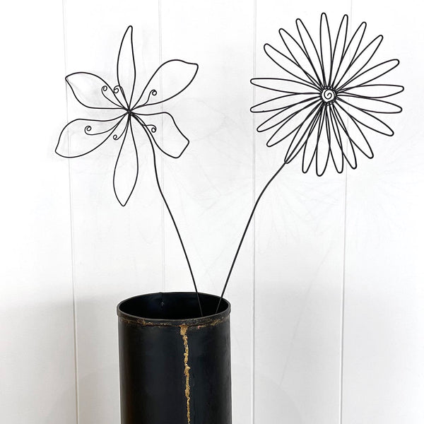 Whether a pretty highlight in a vase, a friendly companion in a pen holder or a sweet surprise in a flower pot, these wire ornaments will awake your creativity and will always bring you joy no matter how you use them.  Details: Decorative wire art Two blossoms to choose from Approx 50x17cm
