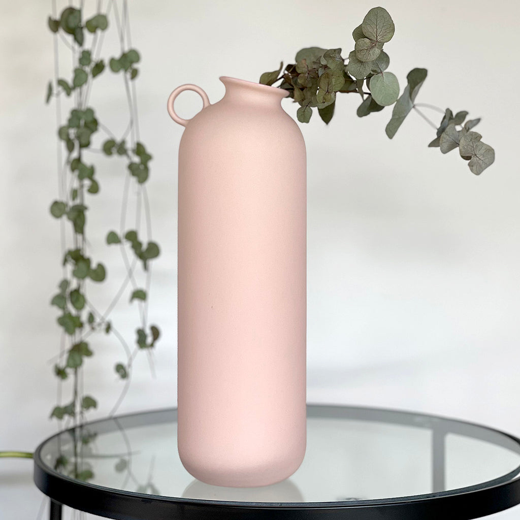 Inspired by Vietnamese Artisans, the Flugen Vase, gives that hand-crafted feel with smooth moulded sides in a modern sleek colour palette, he will blend into your decor. Best for arranging your long stems or display as a set. Two sizes to choose from.  Medium: D12 x H20cm  Large: D10 x H30cm 