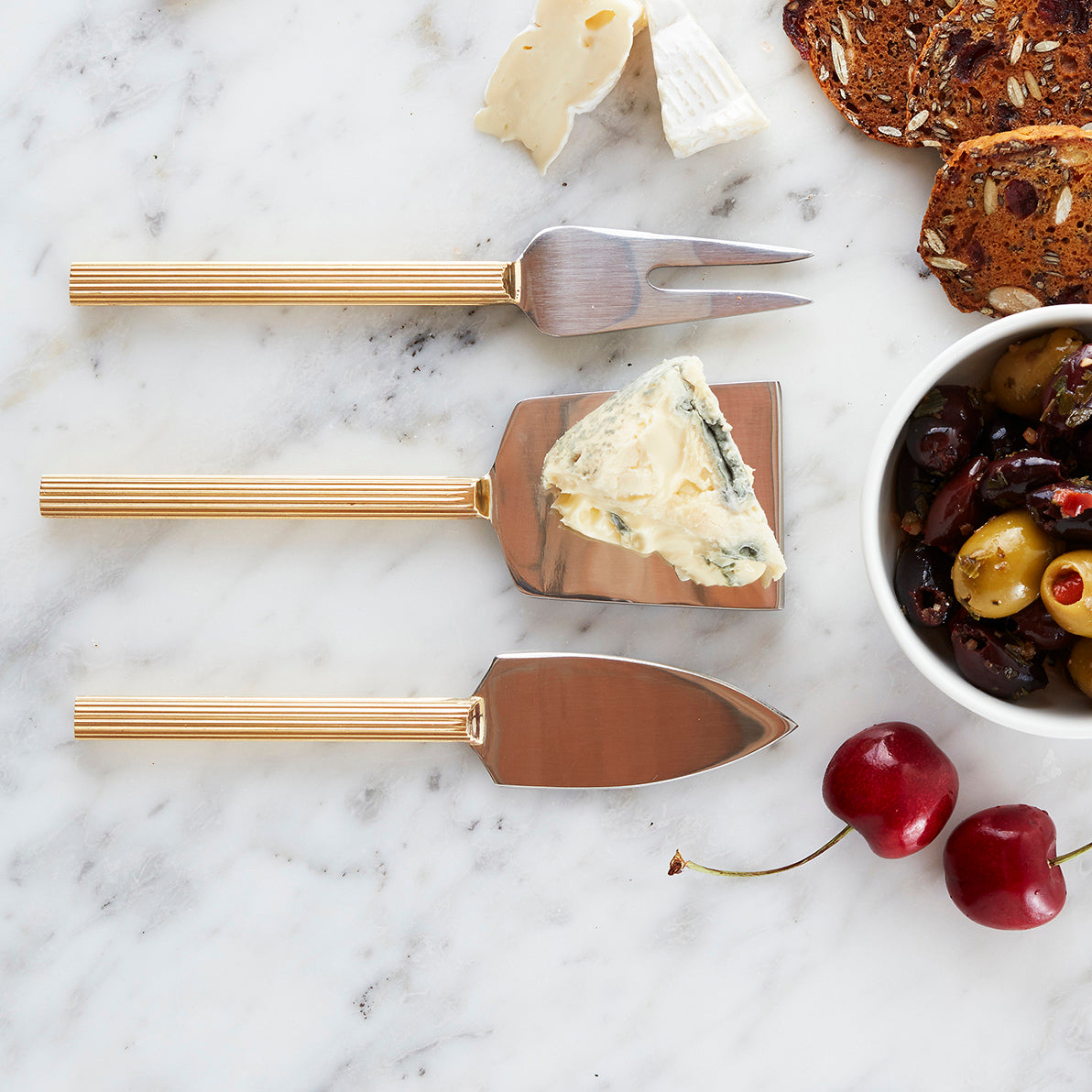 A great gift idea!  This elegant Cheese Knife set with brass coated handles is perfect for presenting platters and hors d'oeuvres.