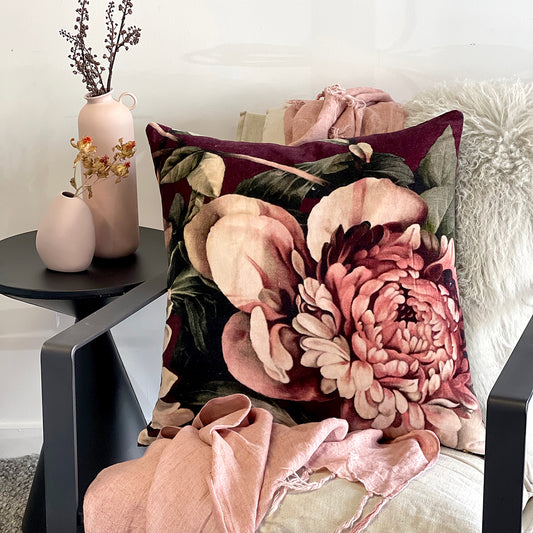 This bold Exotic Floral print cushion will add old-world charm and texture a space, and is the perfect over-sized accessory to brighten up any room, looking gorgeous placed on the bed or sitting in your living room.  • 100% Cotton Velvet cover • 100% White Duck Feather (1400g) • Gold metal zip closure • 60cm x 60cm • Dry Clean only