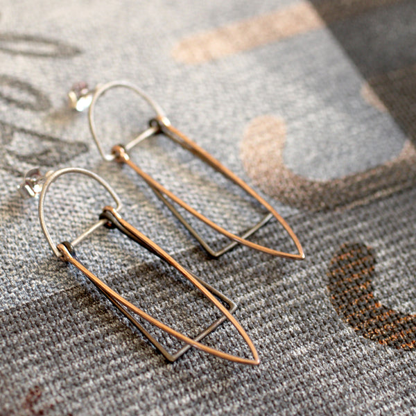 From the Antler Elite range. The Skylar earrings have a stud backing, are handmade from brass metal with silver and gold plating.  Lead | Nickel | Cadmium Free